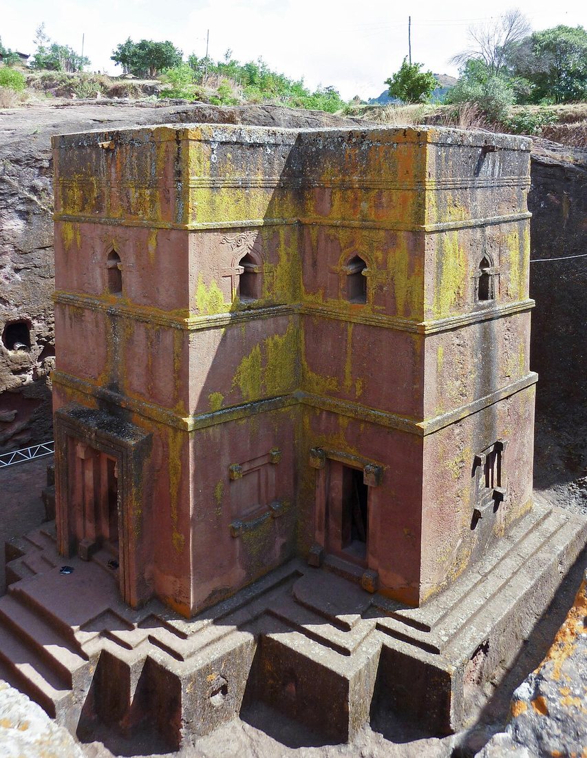 The Church of St George (Bete Giyorgis) at Lalibela, carved downwards into the rock in the shape of a cross. Tradition attributes the Lalibela churches to King Lalibela of the Zagwe dynasty (r. c. 1181–1221); their dating is disputed, but their builders followed the Aksumite style.