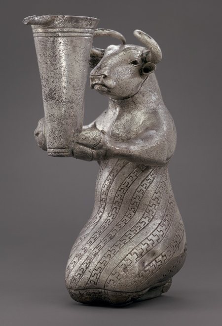 A silver figure of a kneeling bull holding a spouted vessel, Proto-Elamite period (c. 3100–2900 BCE). Metropolitan Museum of Art, New York.