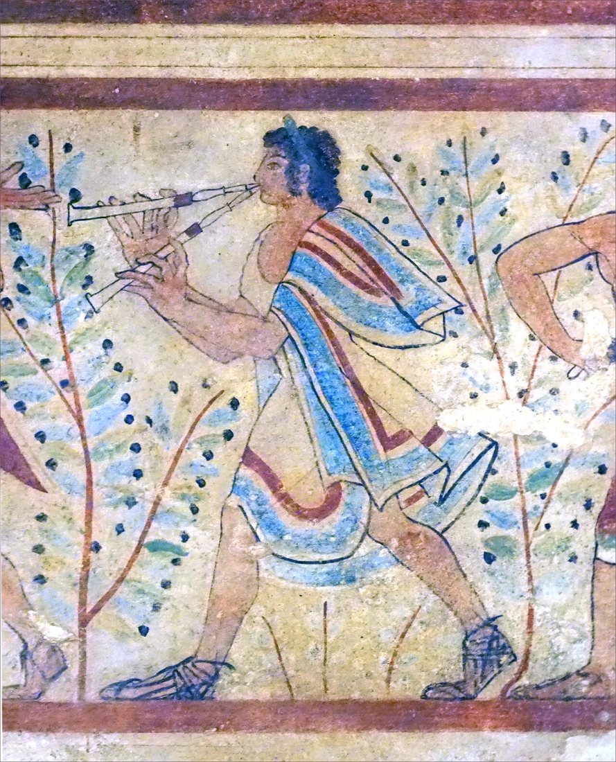 A player of the double pipes (aulos), detail of the painting in the Tomb of the Leopards at Tarquinia.