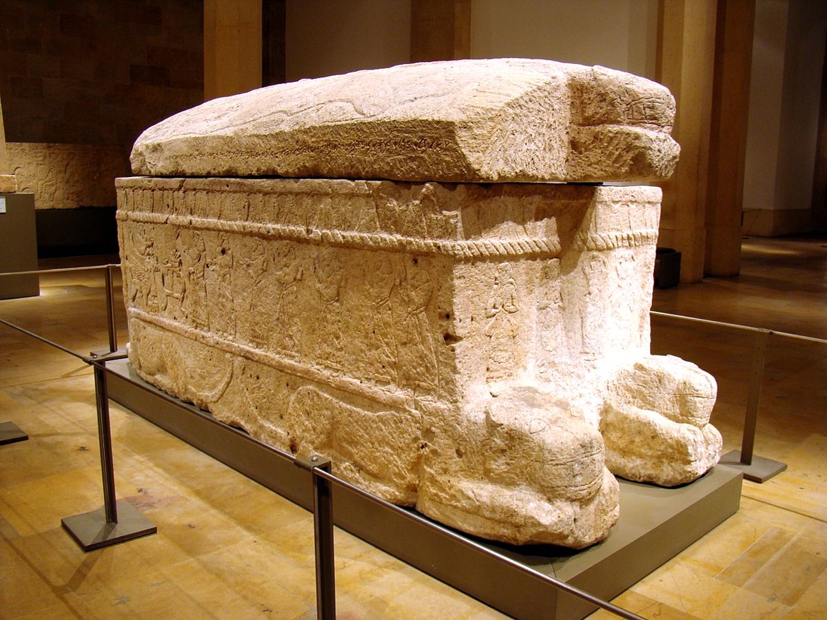 The sarcophagus of King Ahiram of Byblos with reliefs and a Phoenician inscription on the rim and lid. National Museum, Beirut.