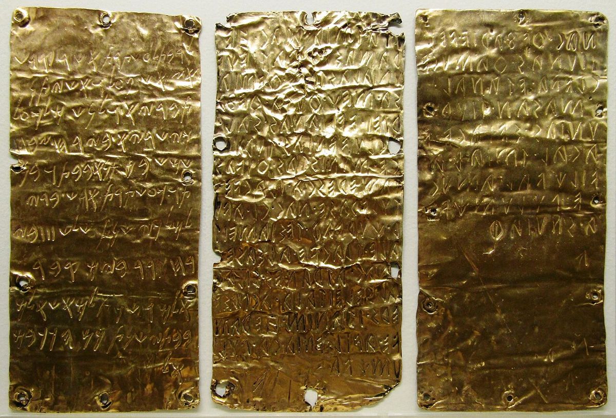 The gold tablets from Pyrgi in Italy (c. 500 BCE) with a dedication in Etruscan and Phoenician.