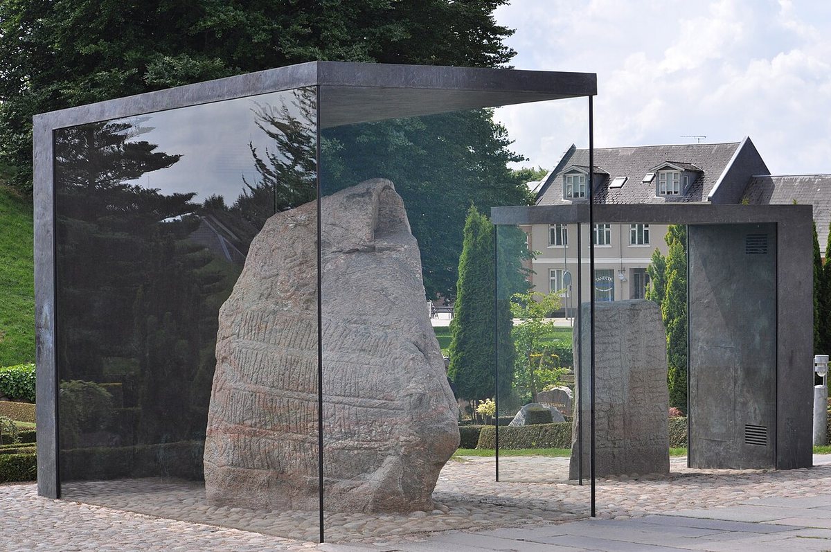 The Jelling stones (Denmark) in their protective glass cases: on the left the large stone of King Harald Bluetooth, on the right the smaller stone of his father Gorm, both from the 10th century. They have been on the UNESCO World Heritage List since 1994.