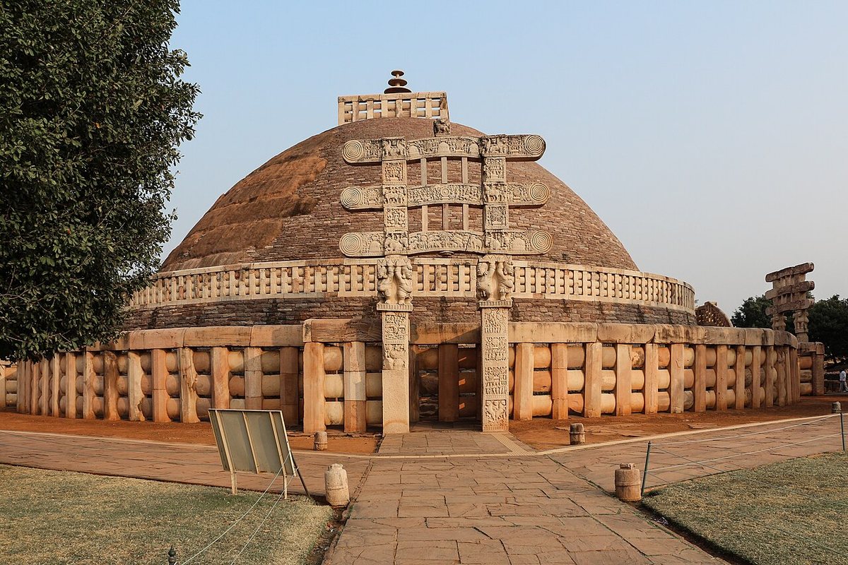 The Great Stupa (Stupa 1) at Sanchi (Madhya Pradesh) with its western gateway. The railings and gateways of the Sanchi stupas carry many short donors’ inscriptions in Brahmi.