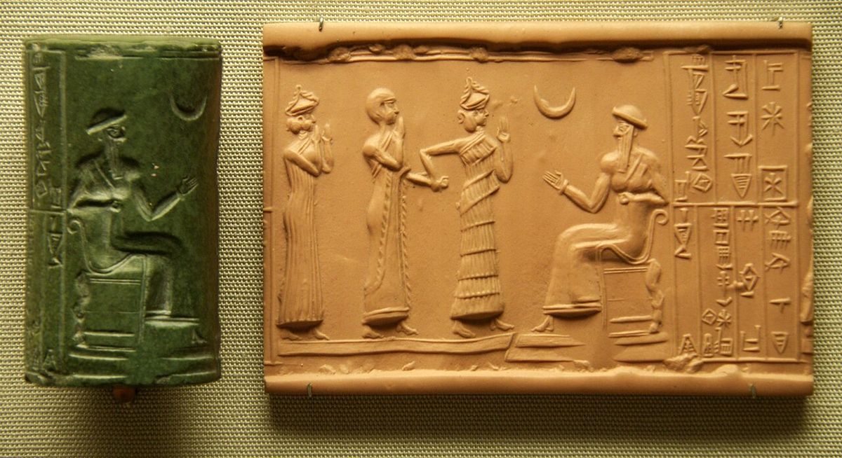 The cylinder seal of Hashhamer, governor of Ishkun-Sin, showing him before the enthroned King Ur-Nammu (21st century BCE), with a modern impression. British Museum, London.