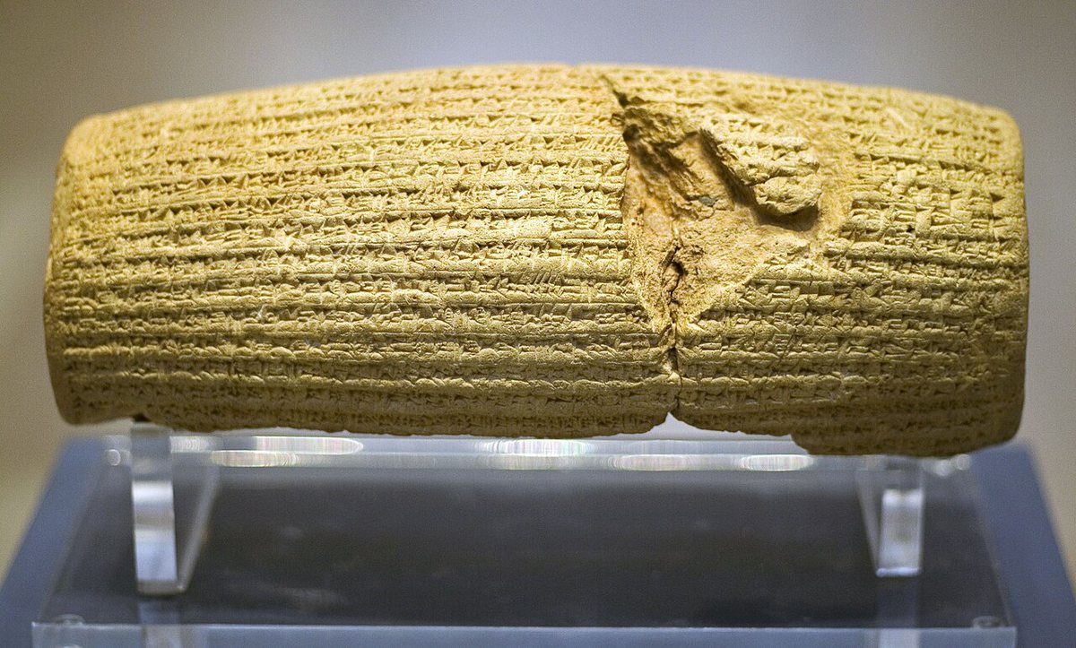 The Cyrus Cylinder: a Babylonian (Akkadian) cuneiform inscription of Cyrus II from after the conquest of Babylon in 539 BCE. Baked clay, about 22 cm long. British Museum, London.