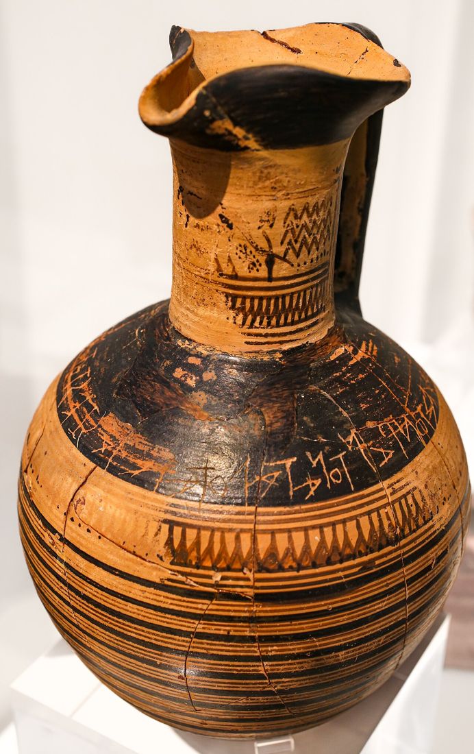 The Dipylon jug (Athens, 8th century BCE) with one of the earliest Greek alphabetic inscriptions scratched on its shoulder. National Archaeological Museum, Athens.