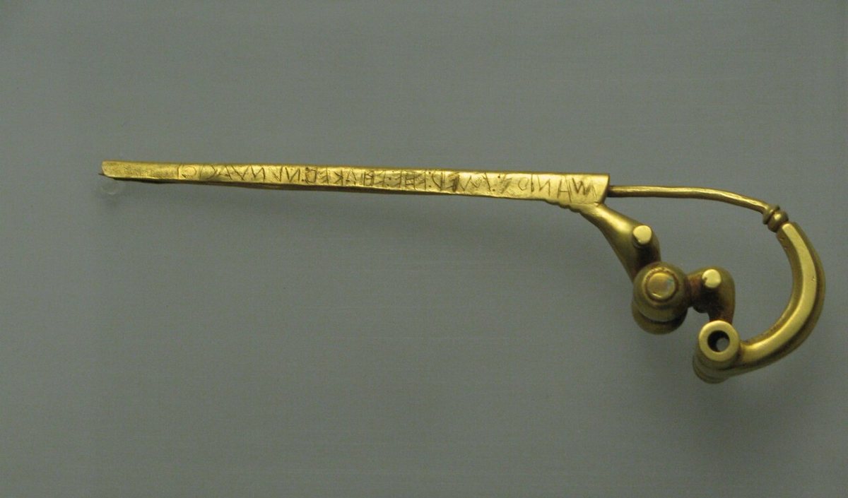 The gold brooch (fibula) from Praeneste, modern Palestrina, inscribed MANIOS MED FHEFHAKED NVMASIOI, read from right to left. If genuine, it dates from the 7th century BCE. Luigi Pigorini National Museum of Prehistory and Ethnography, Rome.