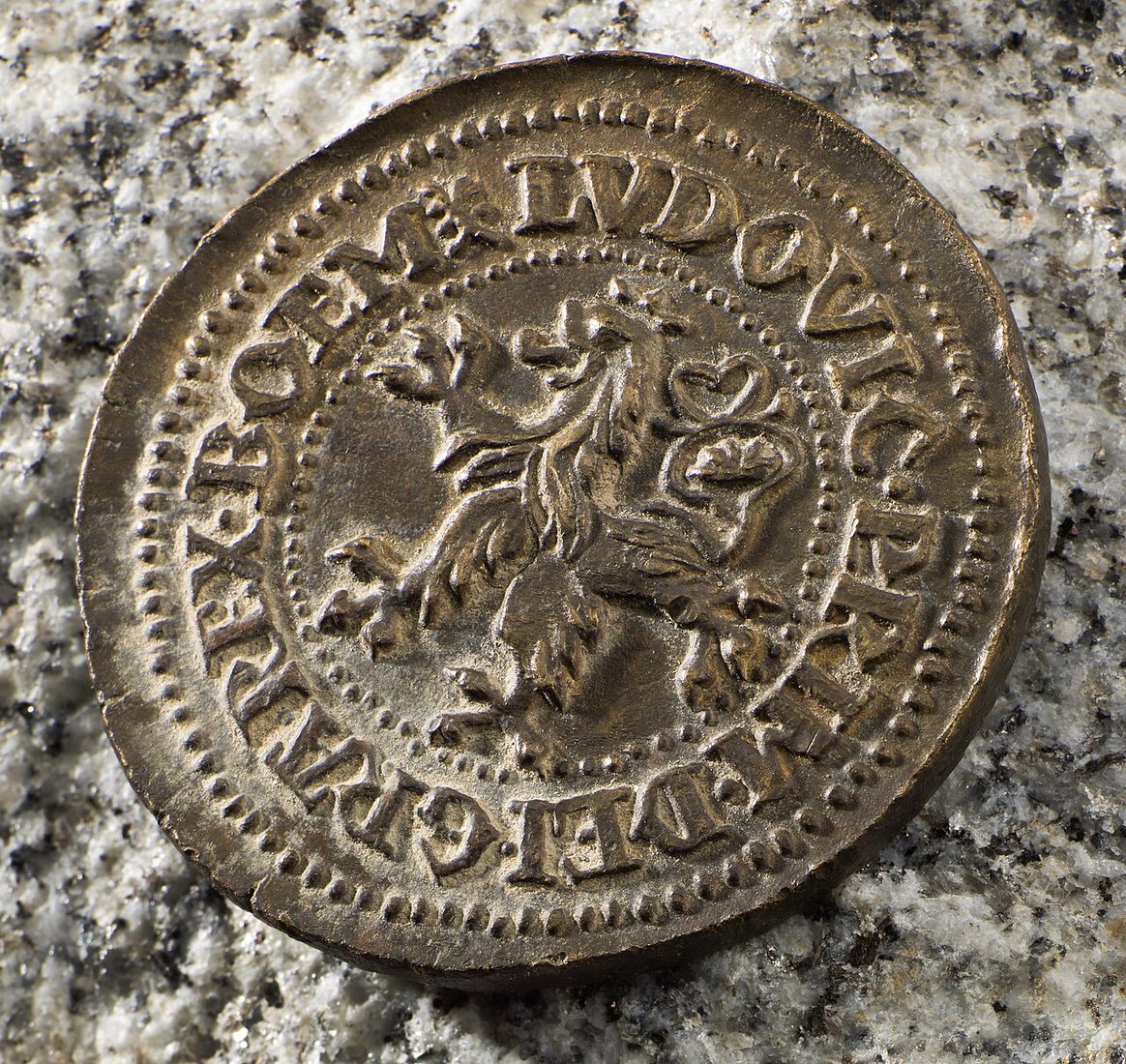 A Joachimsthaler of 1525: the side with the Bohemian lion and the name of King Louis the Jagiellonian. The coin was found in Norway in 2000.